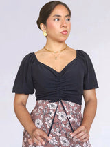 BLUSA CON REGULADOR MANGA CORTA