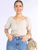 BLUSA CON REGULADOR MANGA CORTA