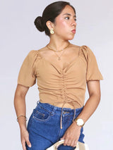 BLUSA CON REGULADOR MANGA CORTA