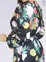 MAXIVESTIDO ENVOLVENTE CON VUELOS ESTAMPADO NEGRO