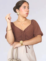 BLUSA CON REGULADOR MANGA CORTA